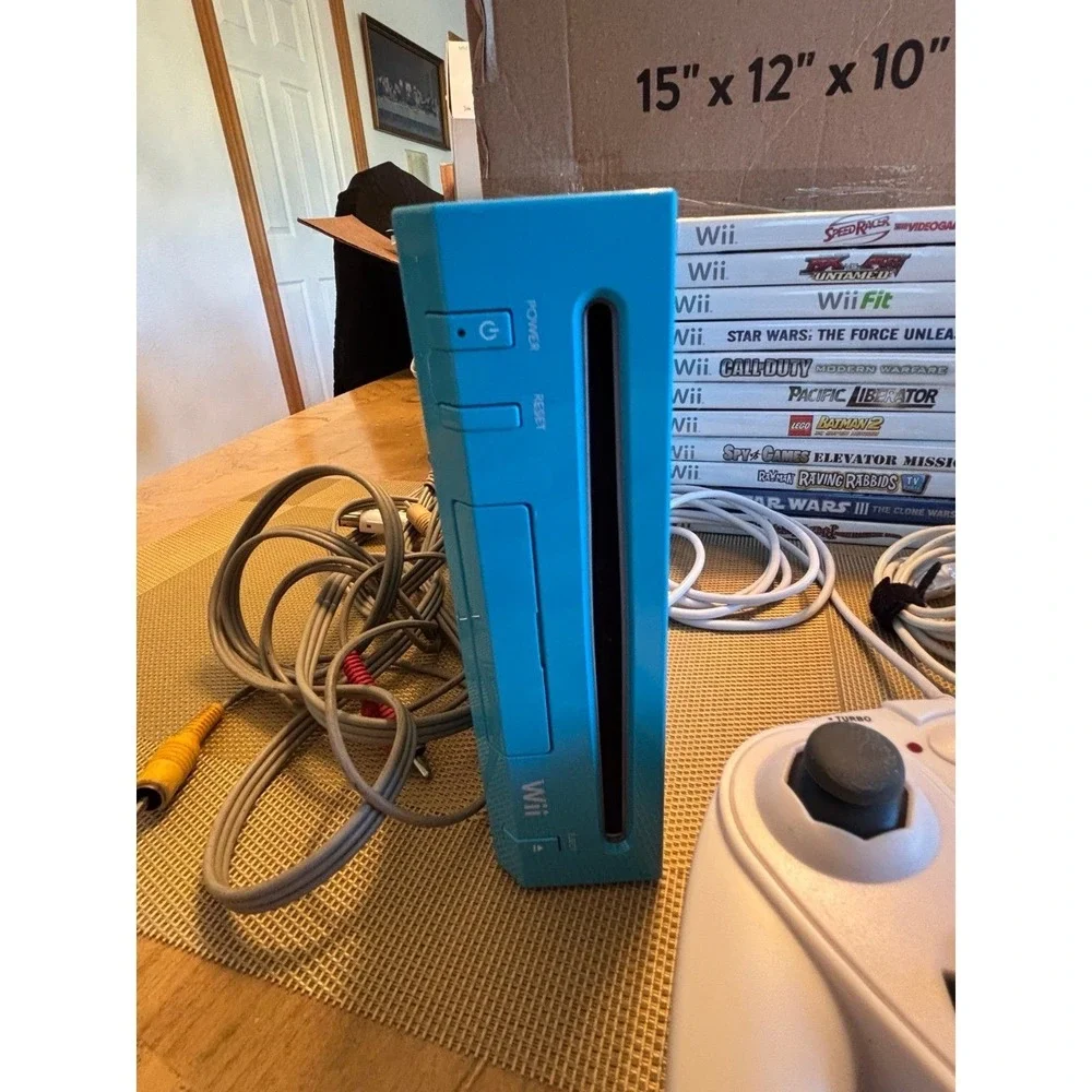 Nintendo Wii. Rare blue limited edition console bundle with Wii box. Many games